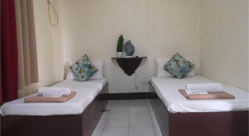 Oyo 880 Flores De Musa Inn Puerto Princesa Eksteriør bilde